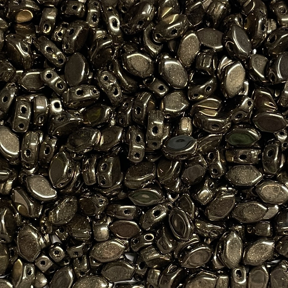 Paros® Par Puca® Dark Gold Bronze, 2-hole beads 7 x 4mm, 60 beads