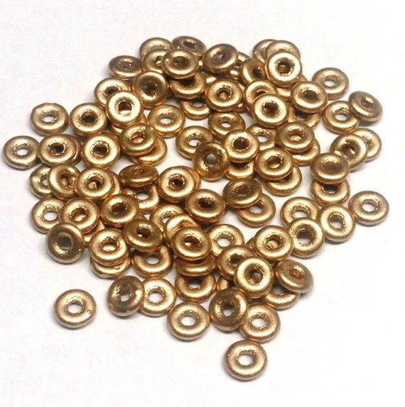 O Bead Aztec Gold, 1X4MM Czech Glass 01710