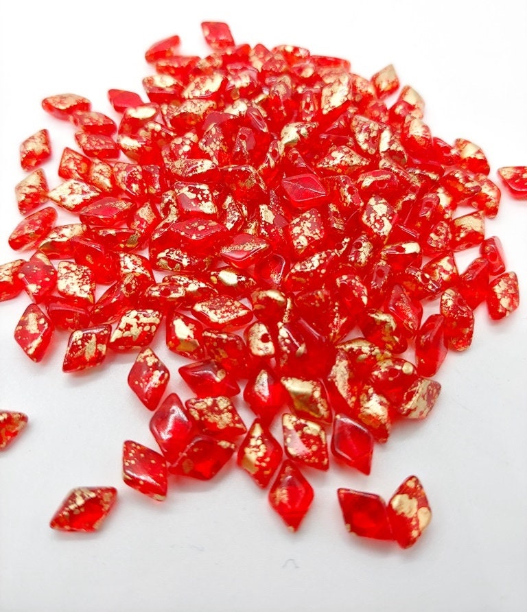 GemDuo Gold Splash Ruby, 2-Hole Matubo Czech beads 8x5mm, 8590080-94401 10 grams