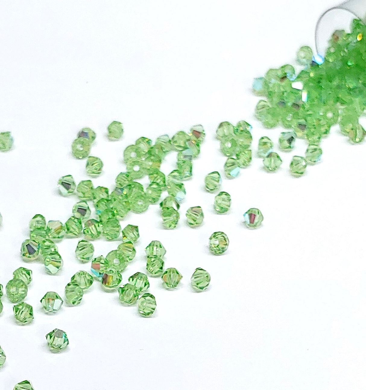 Preciosa 3mm Peridot AB, Crystal Bicone - 36 Crystals