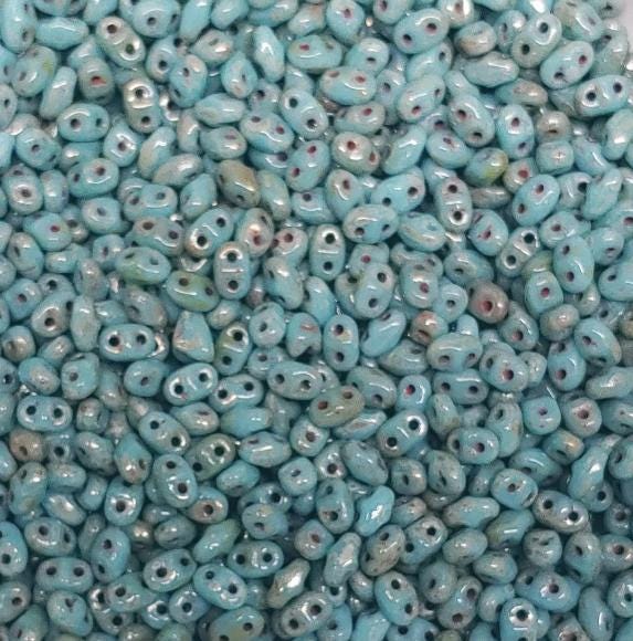 MiniDuo Blue Turquoise-Silver Picasso, 2-Hole 2x4MM Czech Glass, TE6303-10 Grams
