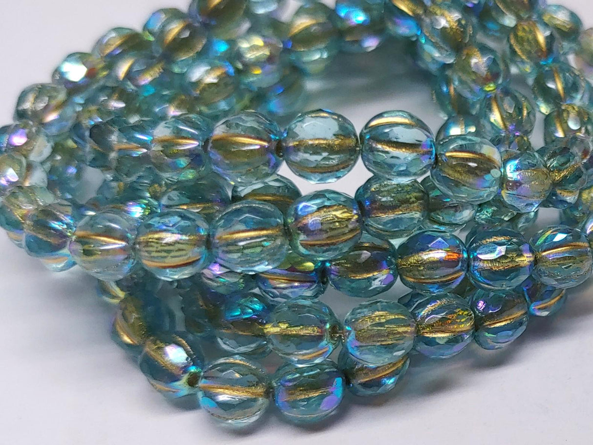 6mm Faceted Melon Baby Blue w/AB Finish & Gold Wash-25 Beads