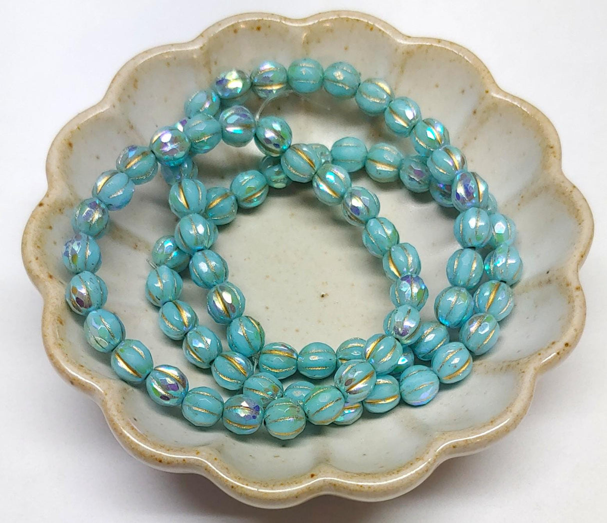 6mm Faceted Melon Sky Blue w/Rainbow AB Finish and Gold Wash-25 Beads