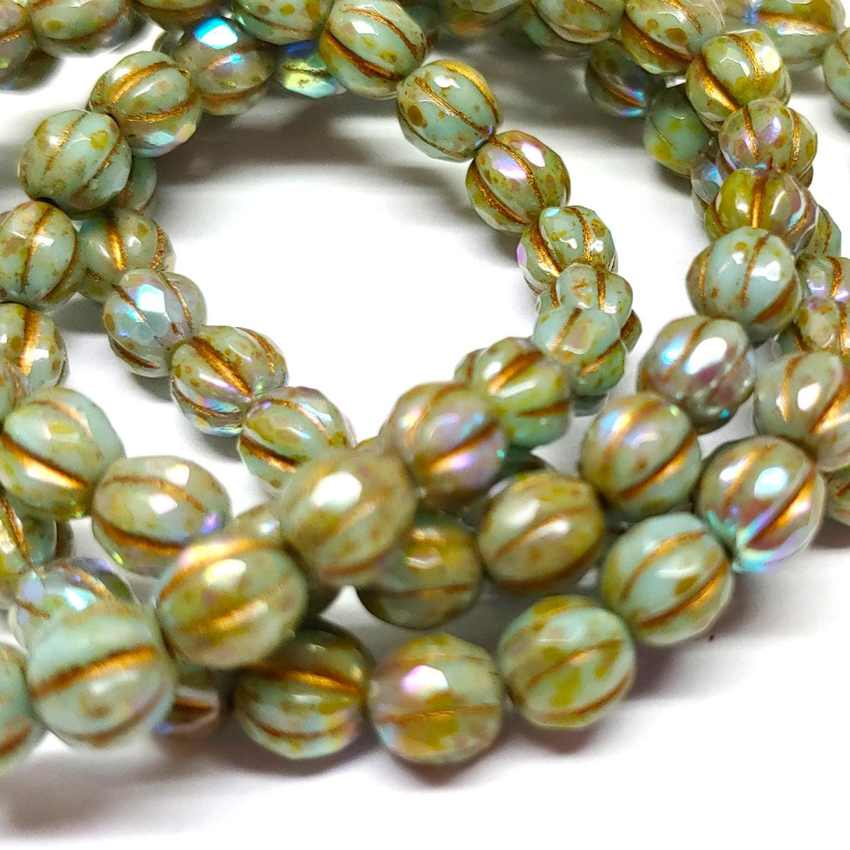 6mm Faceted Melon Tea Green w/Picasso and AB Finishes & Gold Wash-25 Beads