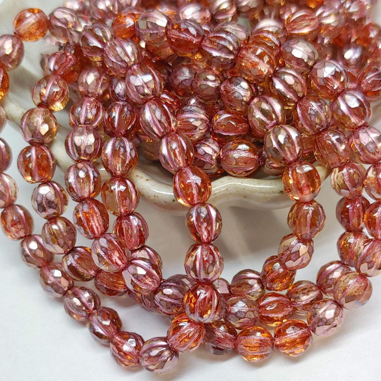 6mm Faceted Melon Peach w/Copper Finish & Metallic Pink Wash-25 Beads