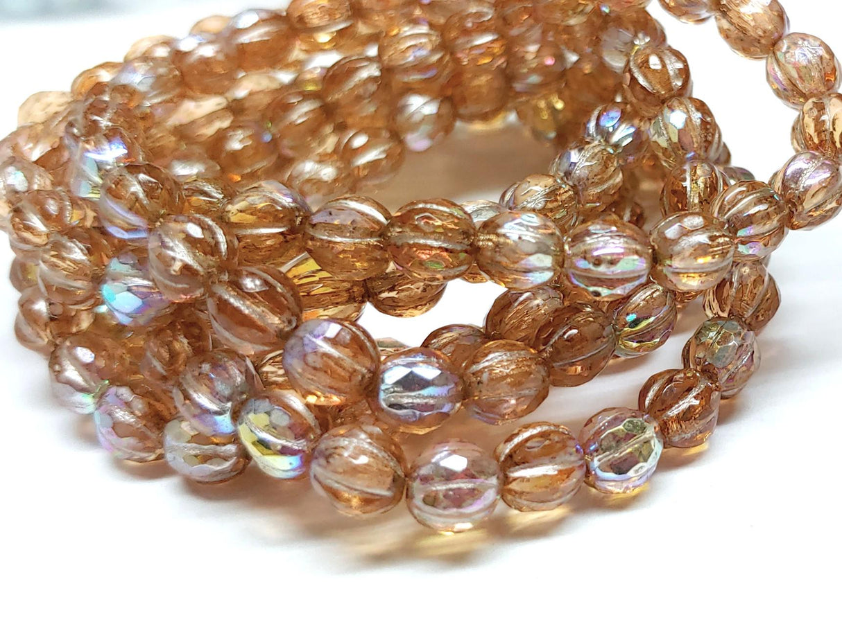 6mm Faceted Melon Peach w/AB Finish & Metallic Beige Wash-25 Beads