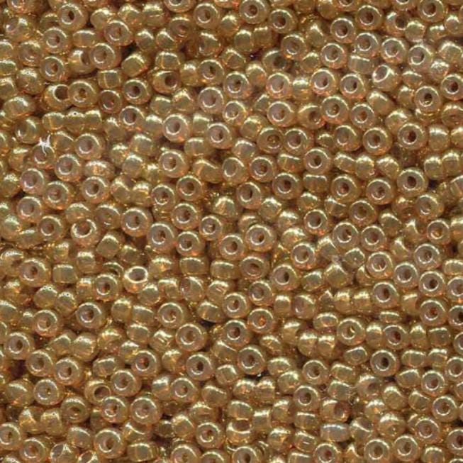 Translucent Spice Miyuki round seed bead in color 2372 size 11.