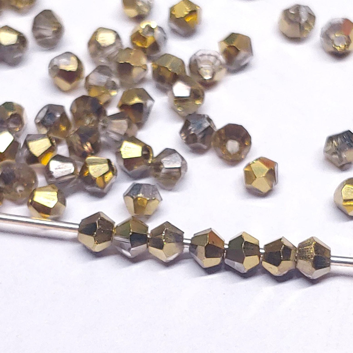 2mm Crystal Amber, Chinese Bicone-72 pieces