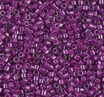 DB0281 11/0 Fuchsia Lined Crystal Luster Miyuki Delica