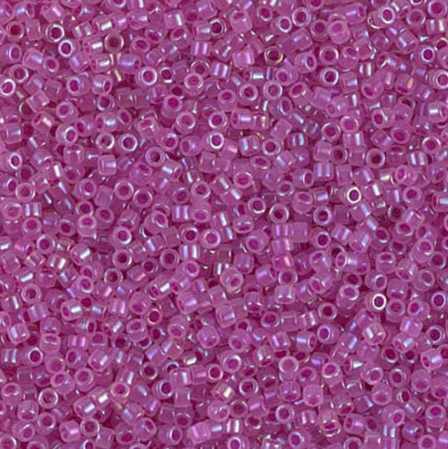 DB1744 11/0 Fuchsia Lined Opal AB Miyuki Delica