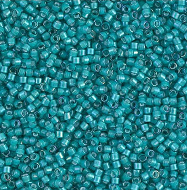 DB1782 11/0 White Lined Teal AB Miyuki Delica