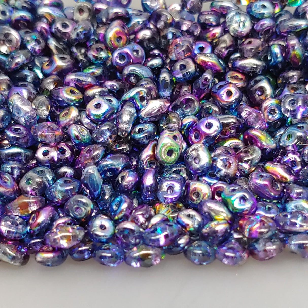 SuperDuo Crystal Magic Blue-Pink, Czech Glass 2-hole bead, 2.5x5mm, 10 grams
