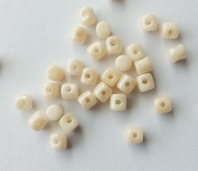 Minos Par Puca Opaque Beige Luster, small round 1 hole beads
