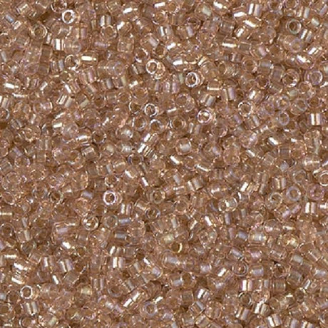 Inside dyed blush Miyuki delica bead  in color DB2373 size 11.