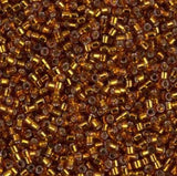 DB0144 11/0 Silver Lined Dark Topaz Miyuki Delica