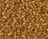 DB0272 11/0 Goldenrod Lined Topaz AB Miyuki Delica