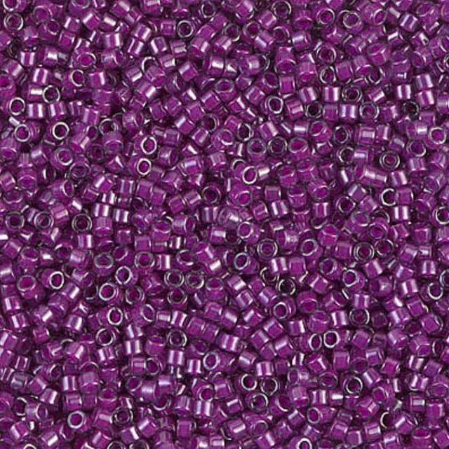 DB0281 11/0 Fuchsia Lined Crystal Luster Miyuki Delica 