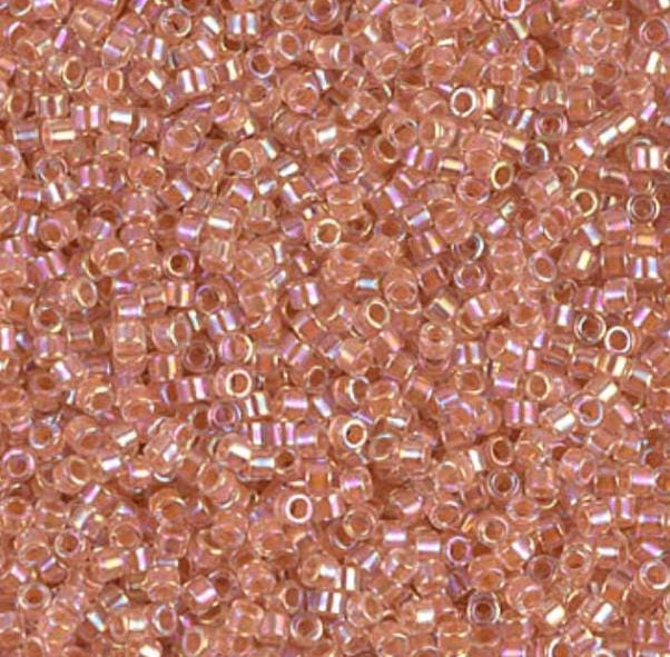 DB0054 11/0 Dark Peach Lined Crystal Miyuki Delica