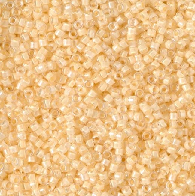 DB2371 11/0 Inside Dyed Ivory Miyuki Delica 