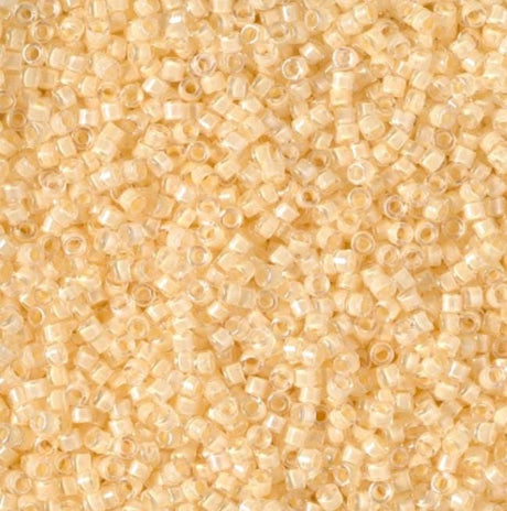 DB2371 11/0 Inside Dyed Ivory Miyuki Delica 